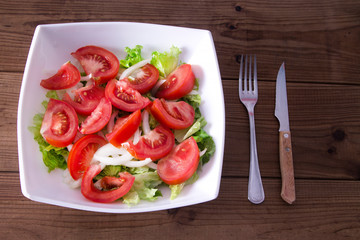 lettuce and tomato salad, diet and food concept