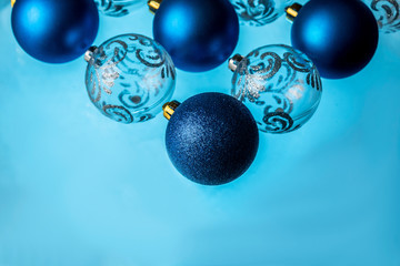 Balls for decorating a Christmas tree on a blue background
