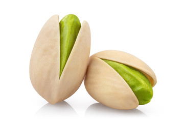 Close-up of tasty pistachios, isolated on white background