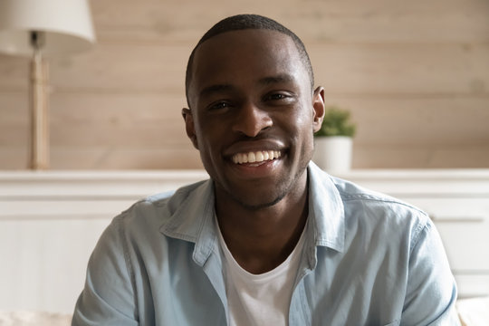 Headshot portrait of biracial man having video call