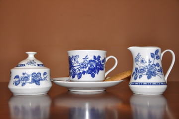 Elegant vintage coffee porcelain drink set on wooden table