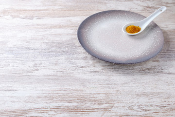 ceramic plate with spoon with curri