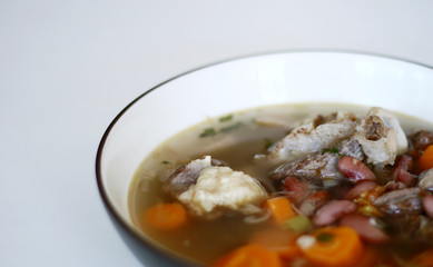 Red kidney bean soup on white background. Indonesian food. 
