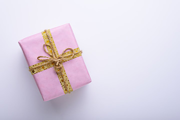 pink pastel gift box on white background