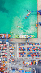 Top view of Deep water port with cargo ship and containers. It is an import and export cargo port...