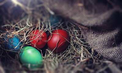 Easter painted eggs on burlap