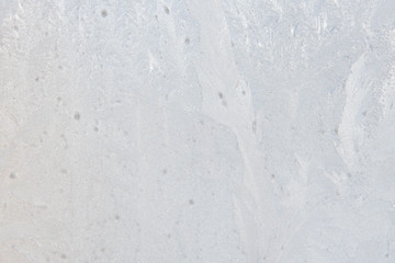 Background. The texture of the frost. Texture of ice. Frost on the glass. Winter has come.