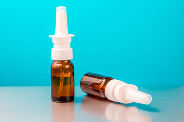 Two bottles with a spray for the nose