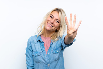 Young blonde woman over isolated white background happy and counting four with fingers