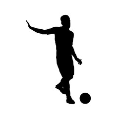 Fototapeta na wymiar Silhouette of football player passing the ball isolated on white background