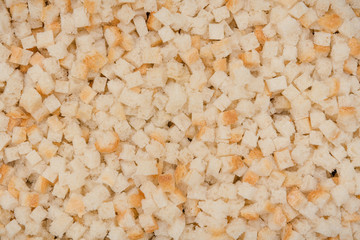 texture of breadcrumbs. sliced bread into slices background. bread texture. Close-up crackers.