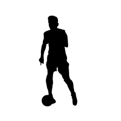 Fototapeta na wymiar Silhouette of football player moving the ball isolated on white background