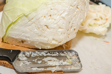 chop cabbage. harvesting cabbage. homemade blanks. a lot of cabbage close-up. cut the camouflage.