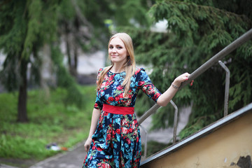 Girl in the street with an umbrella