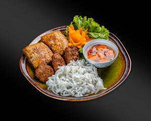 Cha Gio - the general name for rice paper rolls with meat, seafood, vegetables, usually deep-fried; served with various sauces.