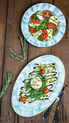 burrata cheese with pesto and arugula