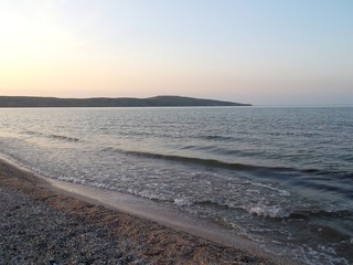 Kazantip at sunset. The view from the shore.  Journeys. Azov sea. Kazantip. Crimea.