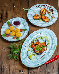 hot snacks: baked zucchini, young fried cheese, baked eggplant with napoli sauce and parmesan