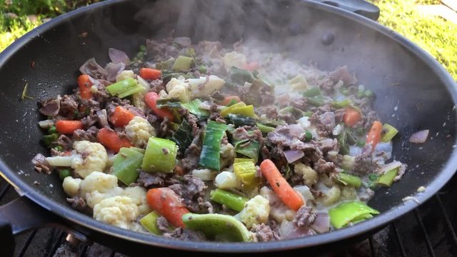 Wok cooking outdoors 