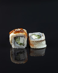 Sushi, rolls, are a traditional dish of the cuisine of the land of the rising sun.