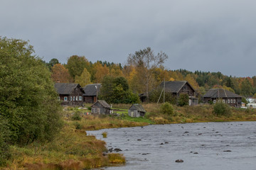 old wooden house on the river
