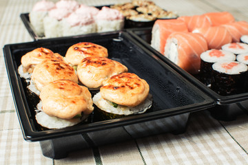 Delicious set of rolls of rice and fish.