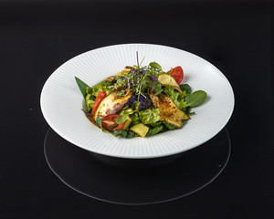 Warm salad with zucchini and avocado Romano salad, avocado, bell pepper, zucchini, soy sauce, Shichimi seasoning olive oil, cherry