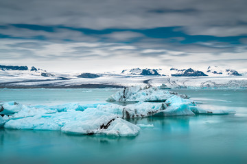 Icebergs float on Jokulsarlon glacier lagoon.