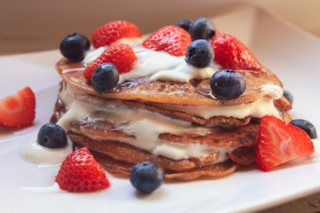 pancakes with blueberries and strawberries