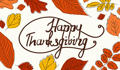 Colorful autumn leaves with greeting text Happy Thanksgiving