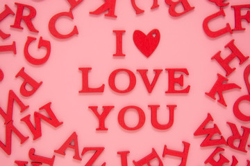 I love you inscription letters on a pink background. Love concept. Valentine's Day background.