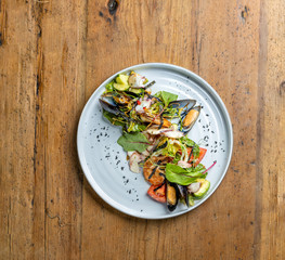 seafood avacado salad: mussels, shrimp, squid, baby octopus