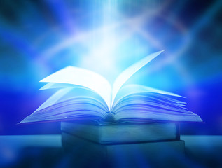 Imagine a picture book of an ancient book opened on a wooden table with a sparkling golden background. With magical power, magic, lightning around a glowing glowing book In the room of darkness