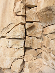 natural beige limestone with vertical and horizontal cracks