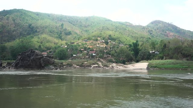 Small Poor Laos Village shot from the Mekong River