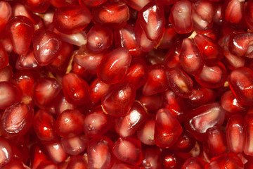 Garnet little seeds red macro for background above view
