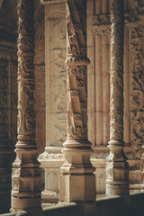 The exterior of  Hieronymites Monastery.View of beautiful reticulated vaulting and columns Manueline architecture style. Famous Lisbon landmark in Belem district and Unesco Heritage.Vintage effect.
