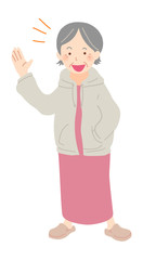 手を挙げるパーカーを着た女性