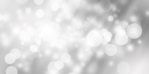 Obraz premium white and gray Christmas light with snowflake bokeh background, Winter backdrop wallpaper.