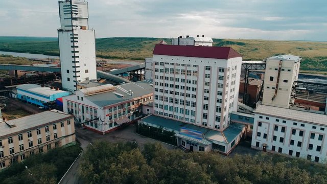 Coal mine with a shaft-head and multiple infrastructure buildings mine a lot of valuable coking coal for the industries of Russia. Copter ( drone ) shooting