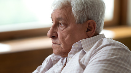 Upset depressed elder male pensioner feeling lonely.