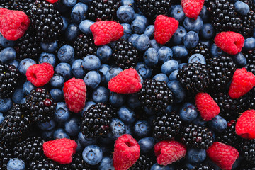 Blackberry, raspberry, blueberry background.  Top view.