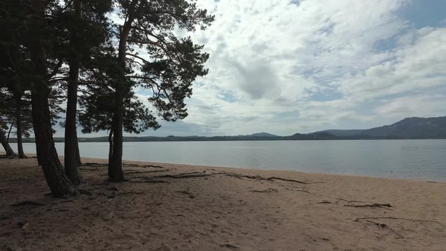 The lake near the mountains, rocks and trees in Borovoe, Kazakhstan