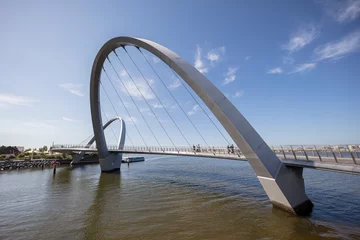 Fotobehang View of the iconic curved pedestrain bridge at Elizabeth Quay in Perth, Western Australia © Michael Evans