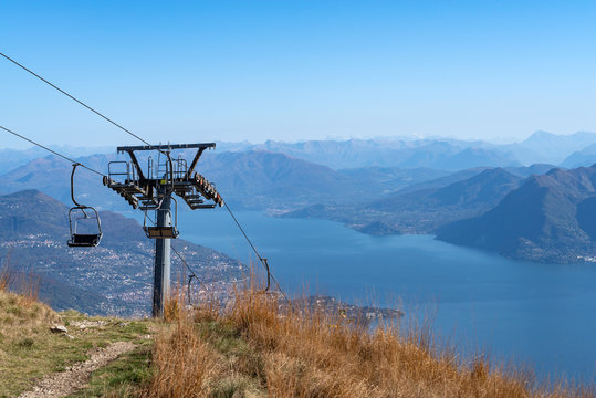 Cableway Stresa-Mottarone and Lake Maggiore from elevated position in the area of Stresa city, Piedmont, Italy