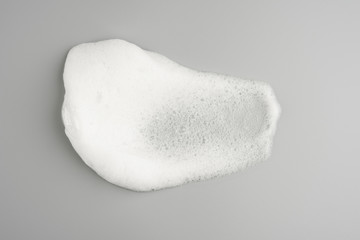 Foam bubble on gray background on top view object beatuy health care concept design
