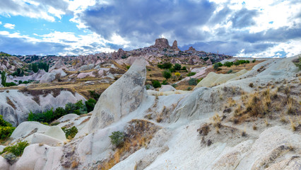 Mountain landscape in Pigeon valley in Cappadocia, Turkey. Unreal rock formations of Cappadocia