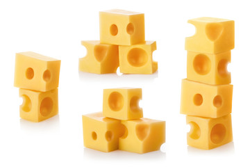 Collection of delicious cheese pieces, isolated on white background