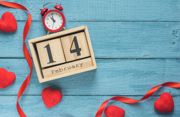 Wooden calendar show of February 14 with red heart