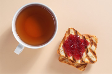 Toasted bread with jam and tea